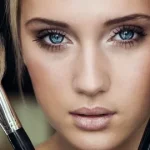 Makeup look featuring foundation, eyeliner, and lipstick on a woman